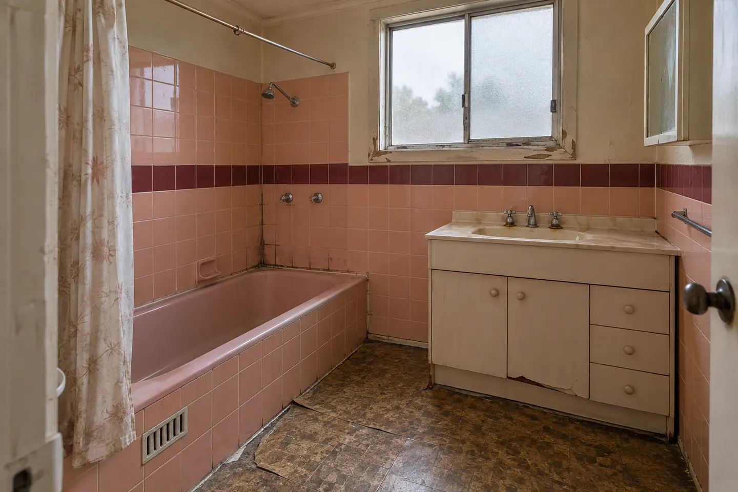 Original 1970s bathroom before renovation in a Barrack Heights home